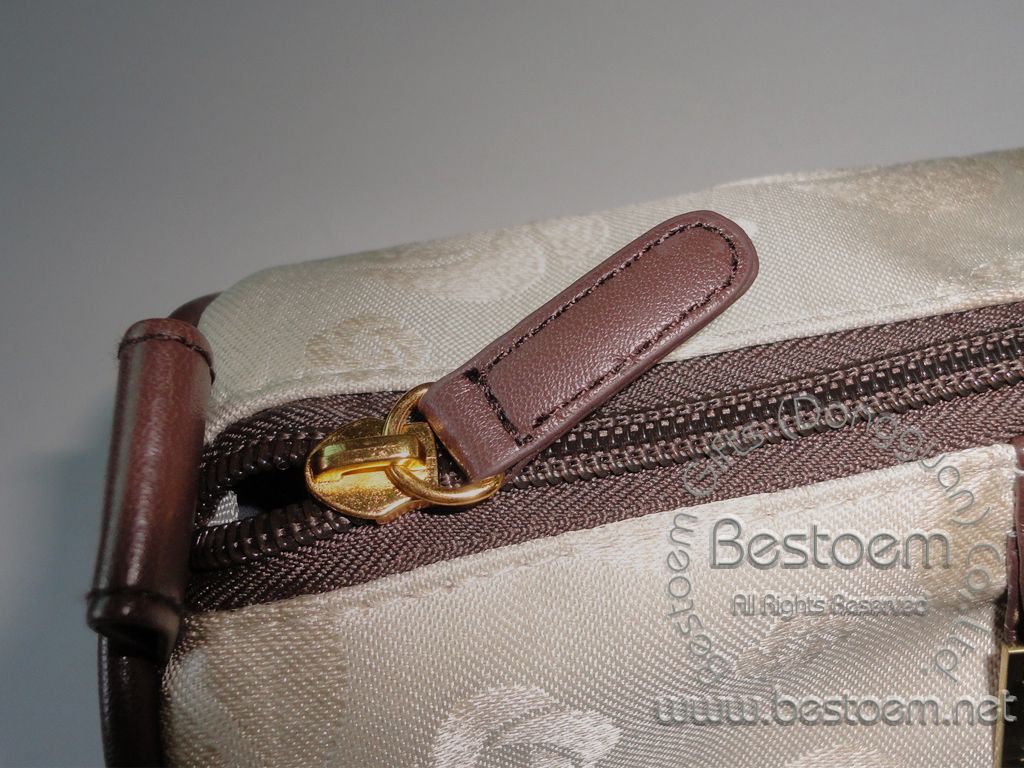 cosmetic pencil case with brown leather zipper puller