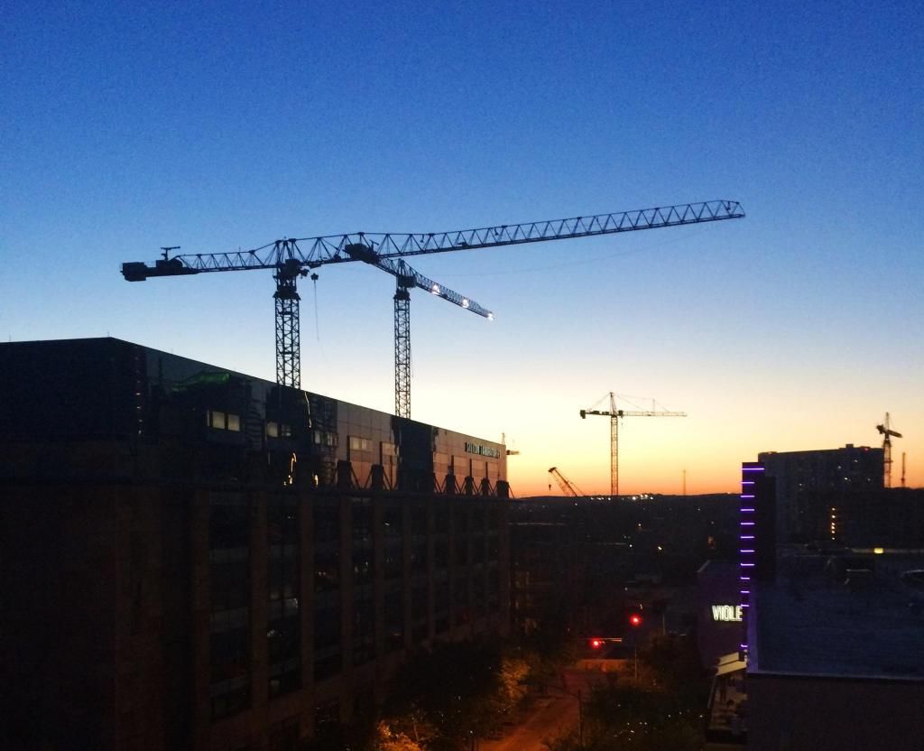 silhouette skyline cranes