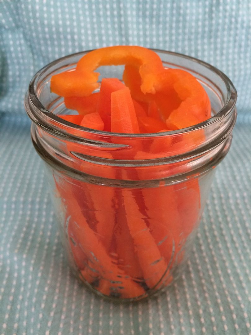 carrot sticks orange peppers in jar